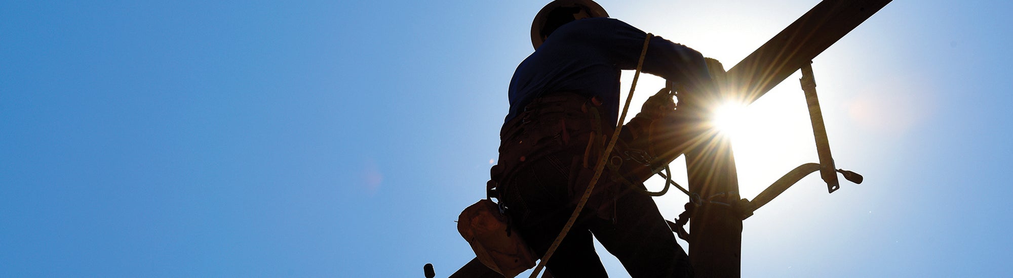 lineworker on pole